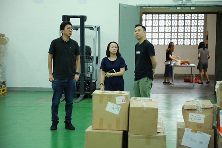 Staff managing stock in the Hong Kong Warehouse